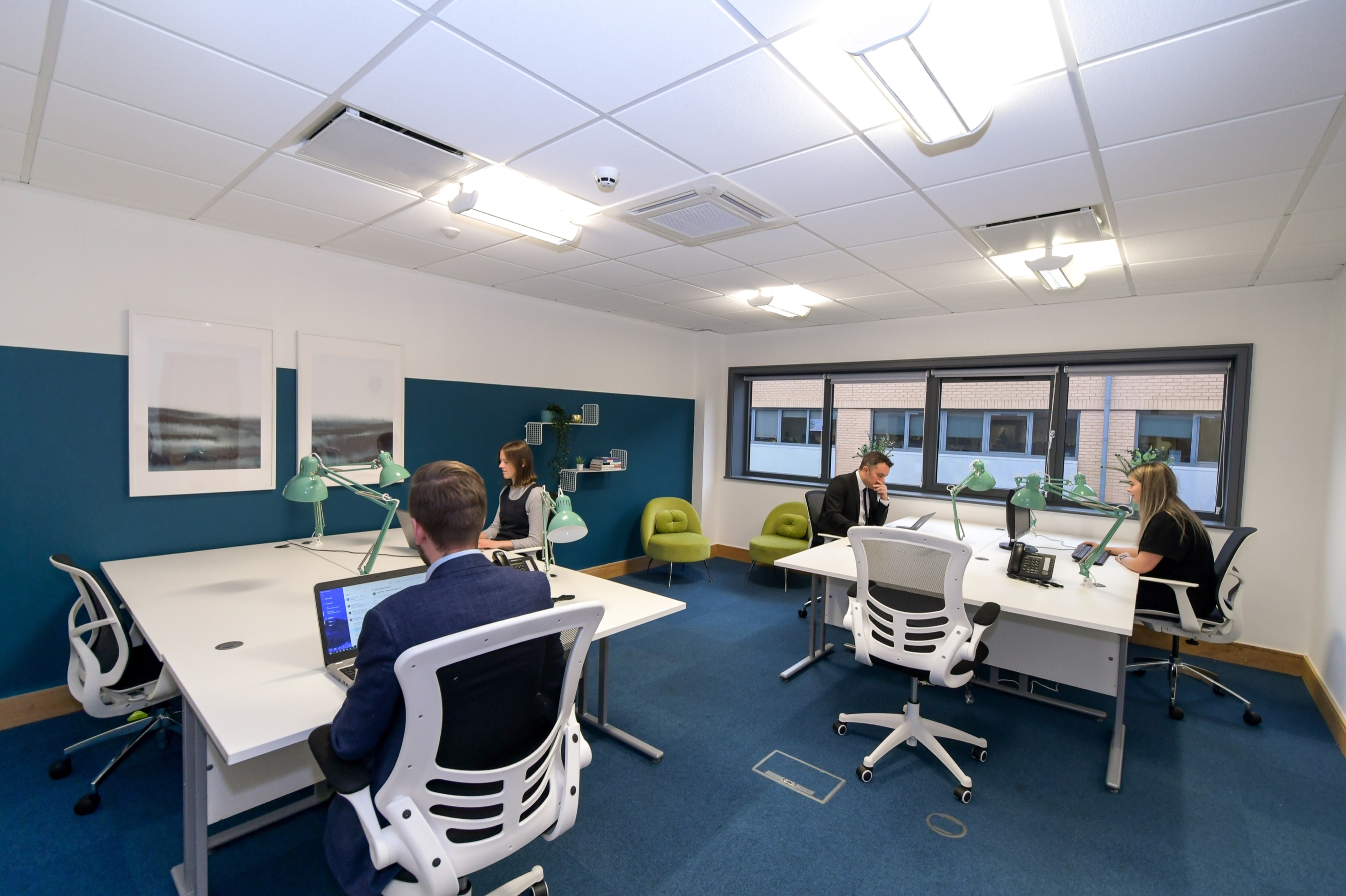 A modern Hope Park serviced office with desks, task lighting and natural light